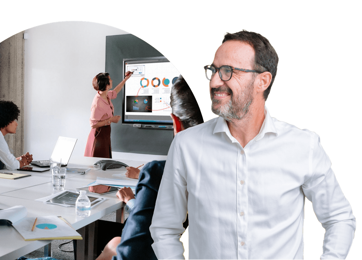 Professional meeting environment showcasing SMART Meeting Pro technology in action, with a group collaborating around a SMART board.